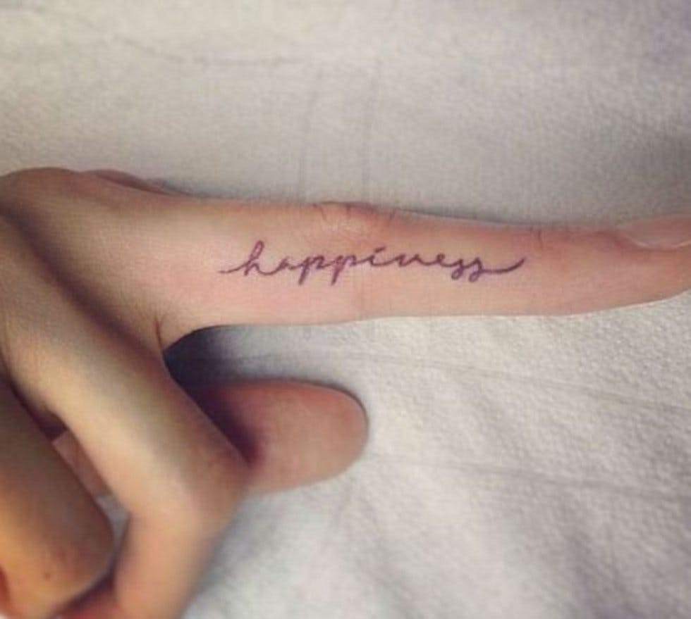 50 delicate and tiny finger tattoos to inspire your first (or next