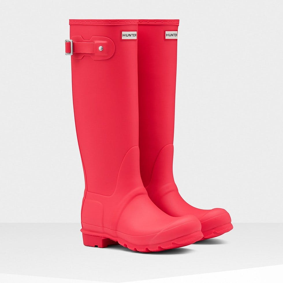 Raincoats, umbrellas and wellies the best rainwear for the worst