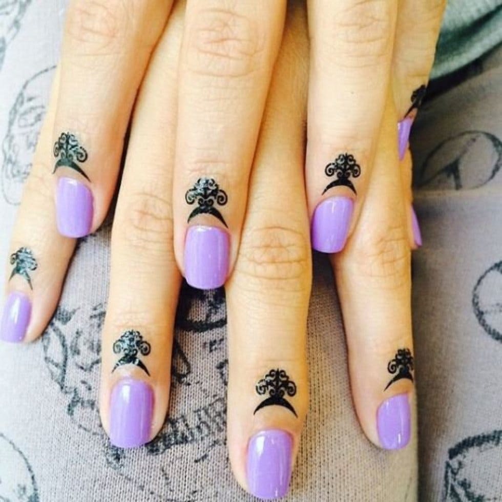 30 intricate and tiny cuticle tattoos to inspire your next inking Stylist