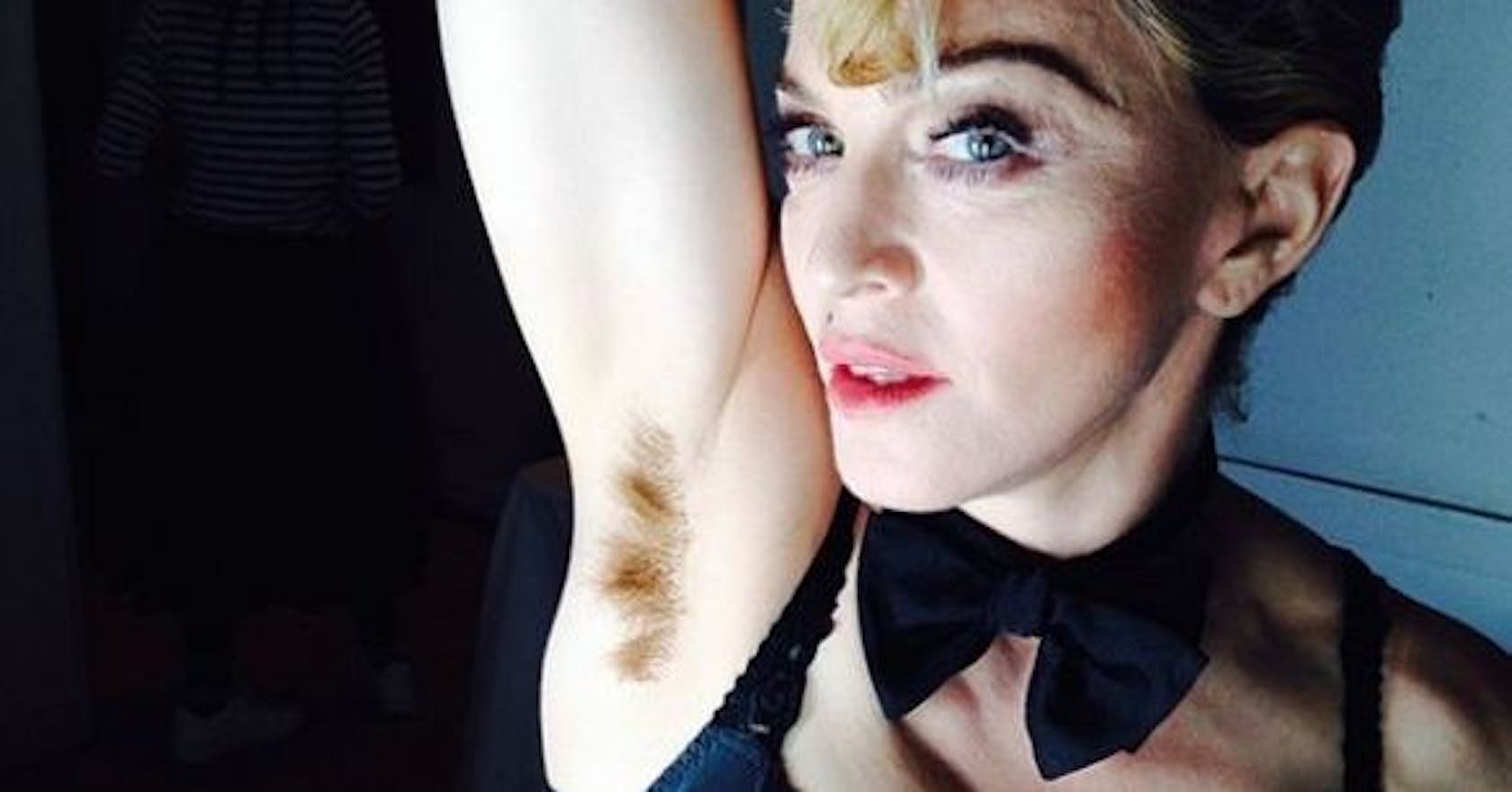 'Long hair, don't care' Madonna debuts hairy armpits - 586 x 307 jpeg 19kB