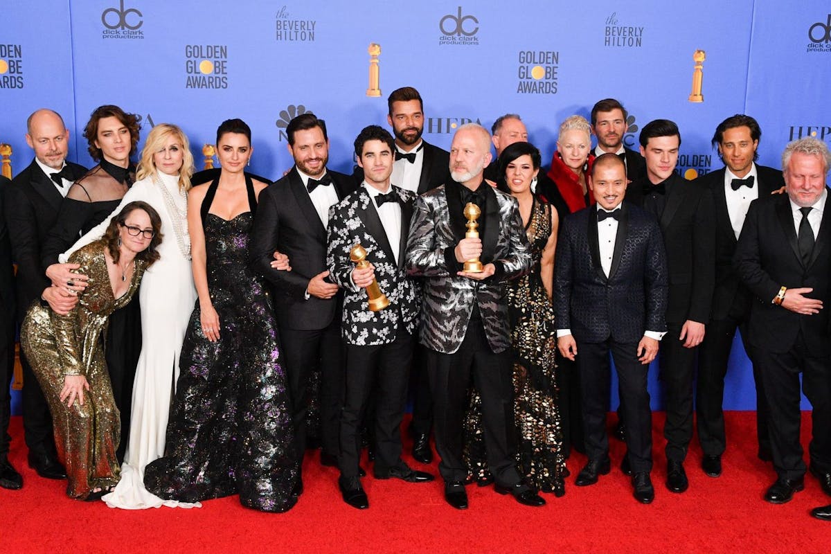 BEVERLY HILLS, CALIFORNIA - JANUARY 06: Outstanding Limited Series award for 'The Assassination of Gianni Versace: American Crime Story' winners, (3rd from L-R) Cody Fern, Judith Light, Penelope Cruz, Edgar Ramirez, Darren Criss, Ricky Martin, Ryan Murphy, Alexis Martin Woodall, (4th from L) Jon Jon Briones, Finn Wittrock, cast and crew pose in the press room during the 75th Annual Golden Globe Awards held at The Beverly Hilton Hotel on January 06, 2019 in Beverly Hills, California. (Photo by George Pimentel/WireImage,)