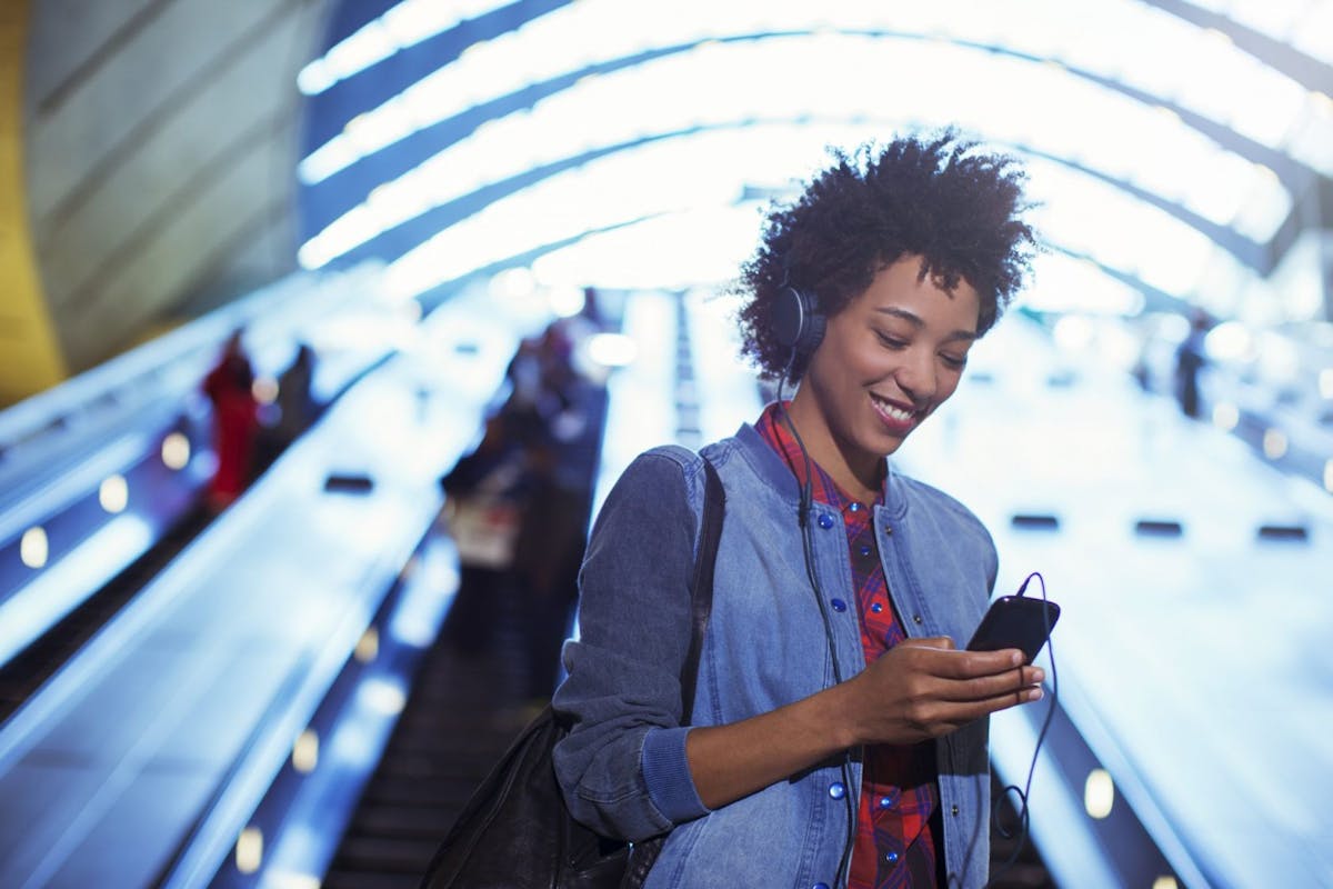 Woman listening to music on commute